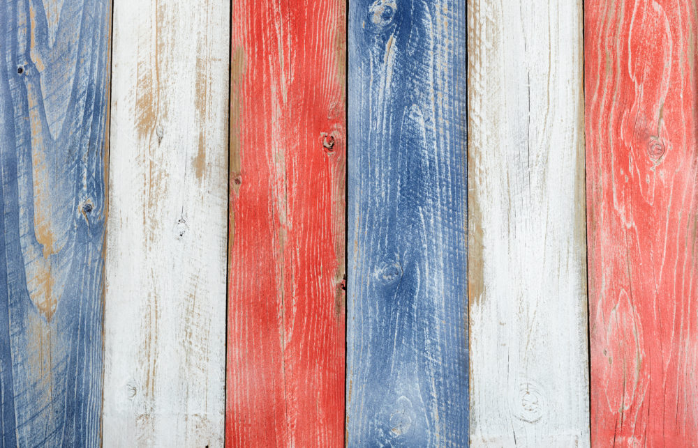 bigstock-123348326 Stressed wooden boards painted red white and blue for patriotic concept of United States of America. Layout in vertical format.