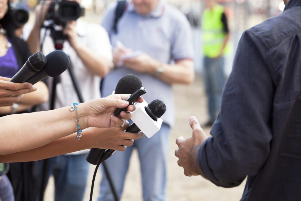 Journalists interviewing spokesman, business man or politician. News conference.
** Note: Visible grain at 100%, best at smaller sizes