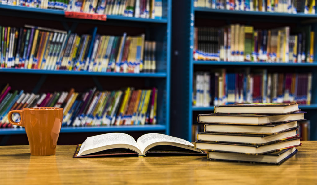 Books concept. Open book, cup of tea and more books on table in Library, Reading And Science, School And University, School Library, Bookstore, Books On Bookshelves, Stack Of Old Books, Stacked Books