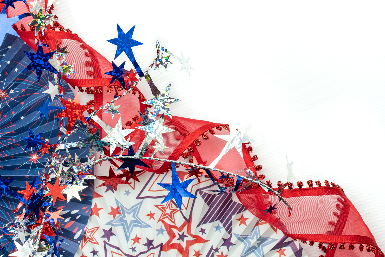 Patriotic Red White And Blue Corner Border Of Pleated Fans And R patriotic red white and blue corner border of pleated fans and red curled ribbon with a sparkly star garland